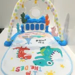 Gimnasio Piano Manta Con Sonajeros Para Bebes Y Con Sonidos Color Celeste Expreso Polar